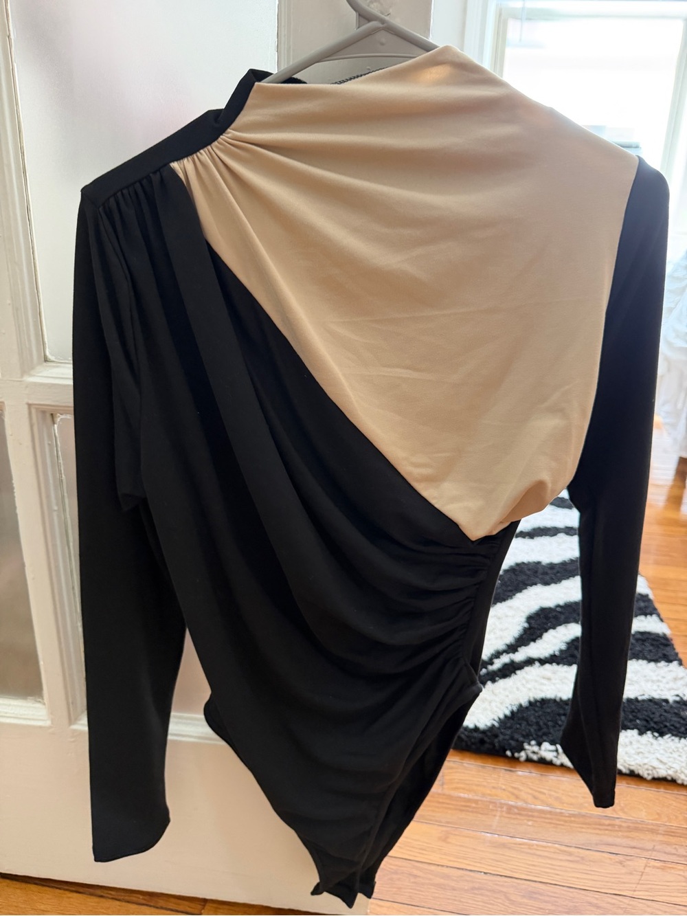 Two-Tone Draped Long Sleeve Top in Black and Beige